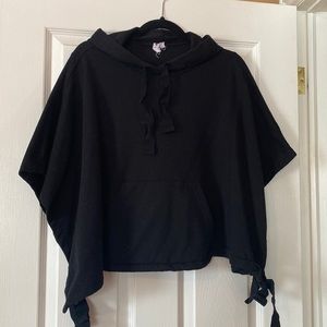 Black poncho style hoodie with ties at sides